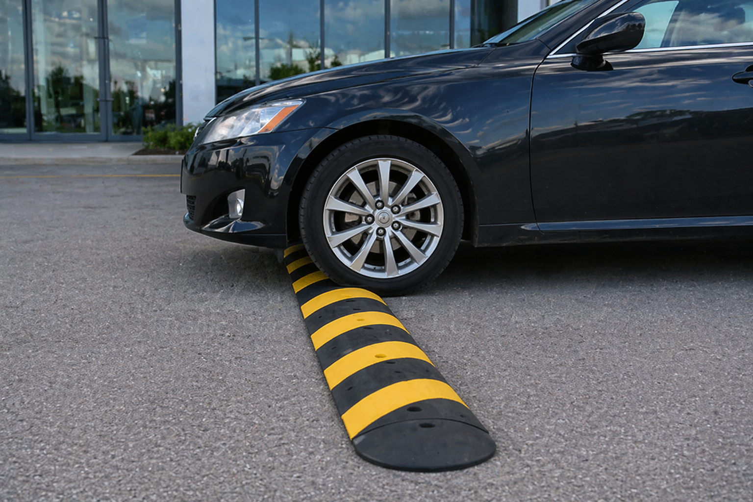Rubber speed bumps, road humps, and parking lot safety signs available in Houston TX
